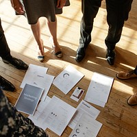 Paperwork on a wooden floor