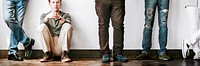 Tired man sitting on a wooden floor