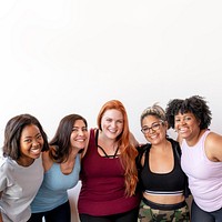 Happy female workout team at the gym