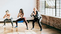 Diverse active women doing squats