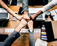 Colleagues giving a fist bump