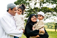 Muslim family having a good time outdoors