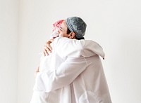 Muslim men hugging each other