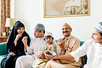 Muslim family having dried dates as a snack