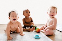Babies playing together in a play room image element