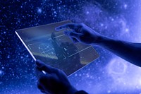 Researcher using a transparent digital tablet screen futuristic technology