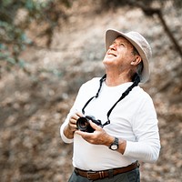 Retired man appreciating the beauty of nature
