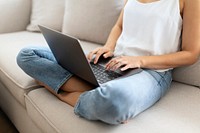 Woman working at home in a Scandinavian decor living room