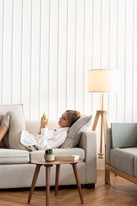 Woman relaxing in a minimal home