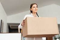 Woman moving in to a new house