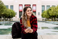 Female student relaxing at campus