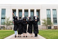 University students in graduation gowns