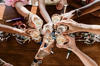 A group of diverse friends toasting at a party