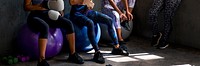 Sportive women talking in a gym