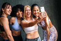 Cheerful sporty women taking a selfie