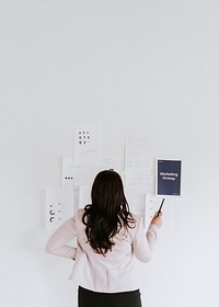 Businesswoman planning a marketing strategy mobile phone wallpaper