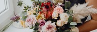 Woman holding a flower bouquet