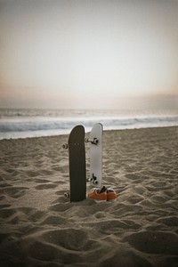 Skateboards at the beach in a film strip