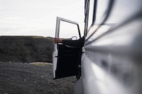 Land Rover on the black sand beach in Iceland