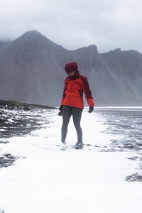 Female photographer at the southeastern Icelandic coast