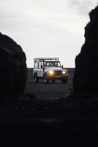 Car driving on the black sand beach, Iceland