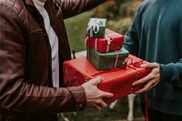 Friends exchanging Christmas gifts