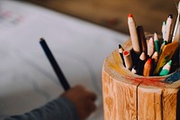 Wooden container with color pencils