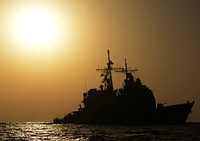The guided missile cruiser USS Gettysburg (CG 64) transits the Gulf of Oman Oct. 18, 2013, in support of Operation Enduring Freedom.