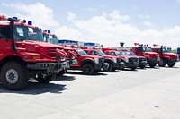 Eight firetrucks on display before a handover by UNSOA to the Federal Government of Somalia on 29th August 2014 at Mogadishu Log Base. The trucks are to be used in Mogadishu, Kismayo, Baidoa, Belet weyne and Bela dogle. UN Photo / David Mutua. Original public domain image from <a href="https://www.flickr.com/photos/au_unistphotostream/15070785401/" target="_blank" rel="noopener noreferrer nofollow">Flickr</a>