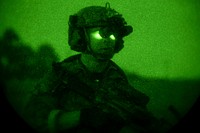 U.S. Army Rangers assigned to the 1st Battalion, 75th Ranger Regiment, based at Hunter Army Airfield, Savannah, Ga., conduct a nighttime airfield seizure on April 14, 2015, at McEntire Joint National Guard Base, S.C. This routine exercise called Multi-Lateral Airborne Training (MLAT), is conducted by special operations forces utilizing advanced training and aircraft to maintain a high level of readiness for the military personnel involved.