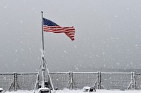 NAPLES, Italy (Feb. 27, 2018) The American flag on the flight deck of the Blue Ridge-class command and control ship USS Mount Whitney (LCC 20) while moored in Naples, Italy, Feb. 27, 2018.