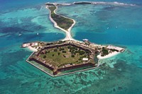 Fort Jefferson from the airClearly, sea level rise and higher storm surges threaten Fort Jefferson in Dry Tortugas National Park. Original public domain image from Flickr