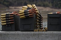 Ammunition sits on a concrete berm before paratroopers assigned to Apache Troop, 1st Squadron (Airborne), 40th Cavalry Regiment, 4th Brigade Combat Team (Airborne), 25th Infantry Division, U.S. Army Alaska, conduct an M2 .50 Caliber, Heavy Barrel, Flexible, Machine Gun range on Joint Base Elmendorf-Richardson, Alaska, Tuesday, April 26, 2016. The M2 is a heavy machine gun that was designed in 1918, has been in service since 1933, is manufactured for use by the United States and its allies and is commonly referred to as the "Ma Deuce." The M2 has been in production longer than any other machine gun. (U.S. Air Force photo/Justin Connaher). Original public domain image from Flickr