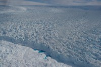 The ice pack on the Jacobshavn Glacier Front outside Ilulissat, Greenland, is seen at its breaking point from a plane carrying U.S. Secretary of State John Kerry on June 17, 2016, on a flight from Kangerlussuaq, Greenland, to Ilulissat as he and Danish Foreign Minister Kristian Jensen prepared to meet with Greenlandic Premier Kim Kielsen and Foreign Minister Vittus Qujaukitsoq and take a cruise through an iceberg field next to the town aboard the HDMS Thetis. [State Department photo/ Public Domain]. Original public domain image from Flickr