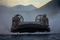 A U.S. Navy landing craft, air cushion, assigned to Assault Craft Unit 4 (ACU 4) and attached to the San Antonio-class amphibious transport dock ship USS New York (LPD 21), transits the Norwegian Sea November 1, 2018.
