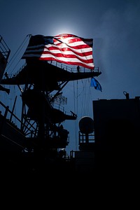 BALTIC SEA (June 9, 2018) The American flag flies from the mast of the Harpers Ferry-class dock landing ship USS Oak Hill (LSD 51) during a photo exercise for exercise Baltic Operations (BALTOPS) 2018, June 9. BALTOPS is the premier annual maritime-focused exercise in the Baltic region and one of the largest exercises in Northern Europe enhancing flexibility and interoperability among allied and partner nations.