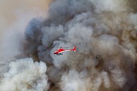 Helicopter support during the Lava Mountain Fire, Shoshone National Forest, Wyoming, July 2016, Martin IMT. (Forest Service photo by Kristen Honig). Original public domain image from Flickr