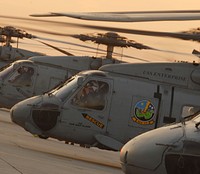 U.S. Navy SH-60 Seahawk helicopters assigned to Anti-Submarine Squadron (HS) 7 depart Naval Air Station Jacksonville, Fla., Jan. 13, 2010, to embark aircraft carrier USS Carl Vinson (CVN 70) en route to Haiti.