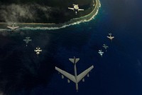 A U.S. Air Force B-52 Stratofortress aircraft from the 20th Expeditionary Bomb Squadron leads a formation of two F-16 Fighting Falcon aircraft assigned to the 18th Aggressor Squadron, two Japanese Air Self-Defense Force F-2 attack fighters from the 6th Tactical Fighter Squadron, two U.S. Navy EA-6B Prowler aircraft from Electronic Attack Squadron 136 and a Japanese E-2C Hawkeye aircraft from 601st Squadron on a flight over Guam during exercise Cope North Feb. 15, 2010.