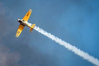 Aircraft fly overhead during the 2019 EAA AirVenture Oshkosh July 25, 2019, in Oshkosh, Wisconsin.