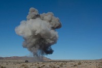 An Armored Vehicle-Launched MICLIC (AVLM) from the 391st Mobile Augmentation Company (MAC) detonates its line charge after firing a Mine Clearing Line Charge (MICLIC) rocket, during a rotation at the National Training Center (NTC), Fort Irwin, California, January 23, 2019.