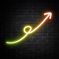 Neon green and red swirl arrow sign on brick wall