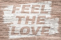 Bold italic feel the love text wood texture