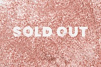 Sold out typography on a copper glitter background
