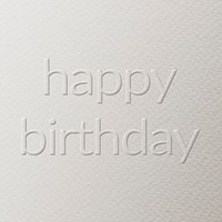 Happy birthday embossed text white paper background