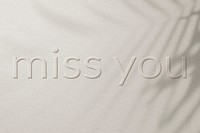 Phrase miss you embossed letter typography design