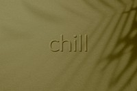 Embossed chill word textured concrete backdrop typography