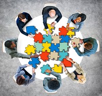 Group of People with Jigsaw Puzzle in Photo and Illustration
