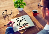 Man with a Note and a Word Profit Margin