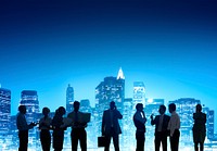 Group Of Business People Working Outdoors With Cityscape As A Background View